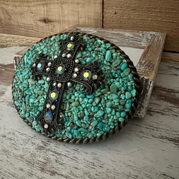 Western style belt buckle with cross and turquoise detail. It’s Vintage NWT